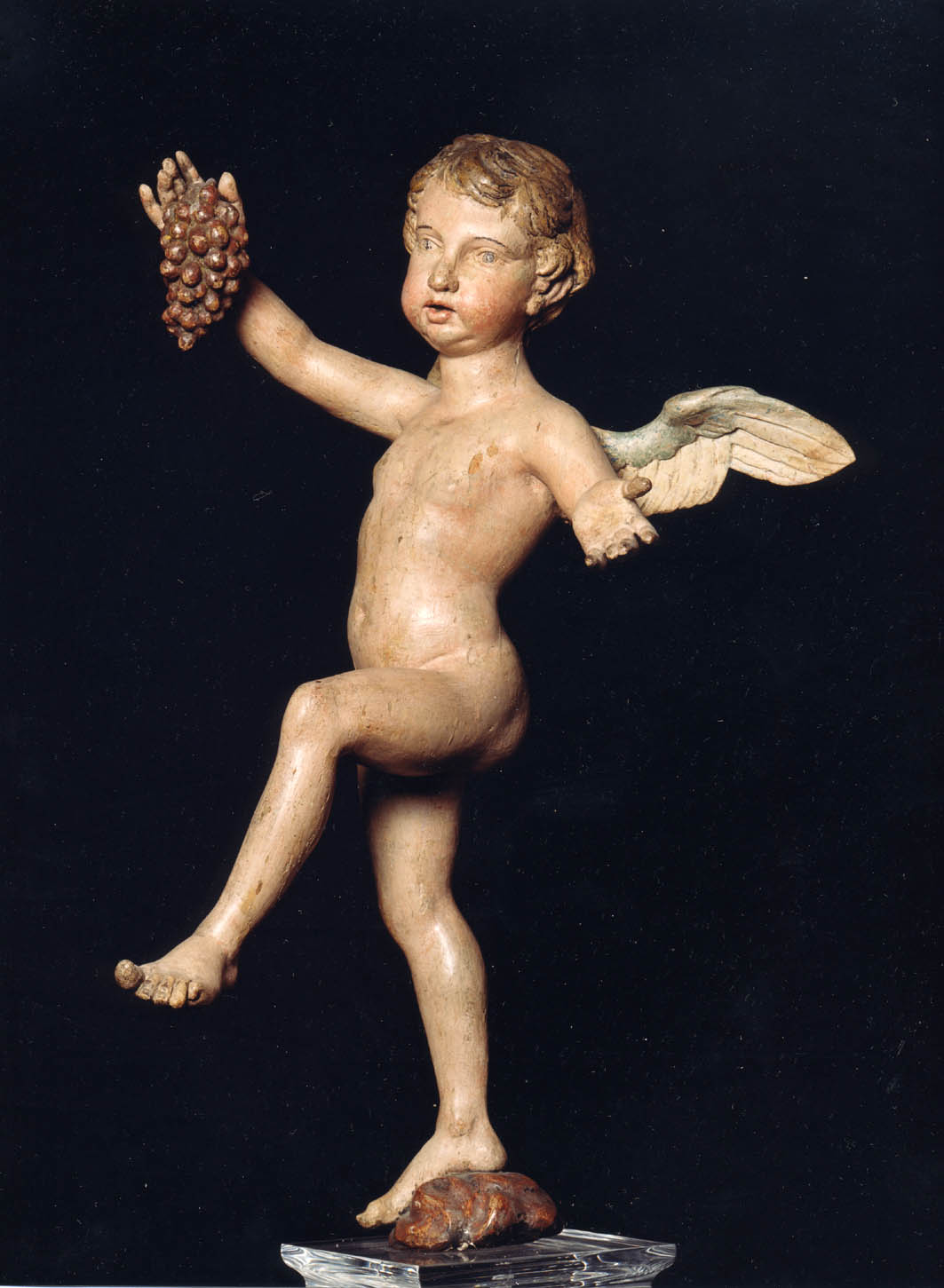 Domenico Cafaggi  (Firenze, 1530 – Siena, 1608)  Tre amorini danzanti, in atto di porgere frutti Legno scolpito e dipinto, cm 55 altezza